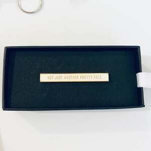 Easy, Tiger Tie Bar “NOT JUST ANOTHER PRETTY FACE”